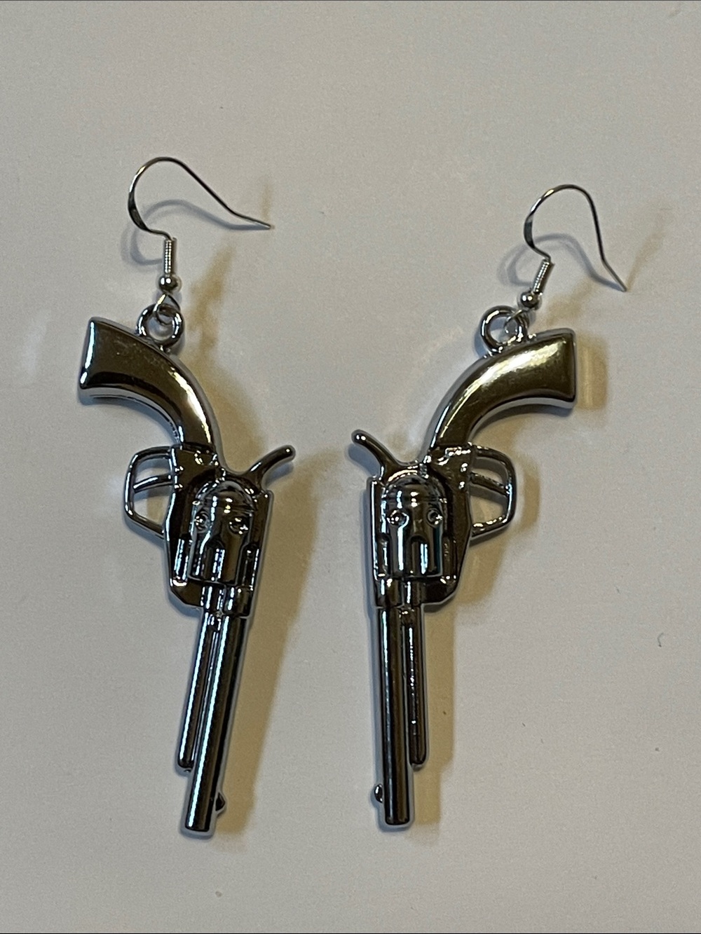 Gun-Shaped Dangle Earrings in Shiny Silver